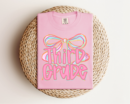Poppy Pink Bow Grade Level Tee